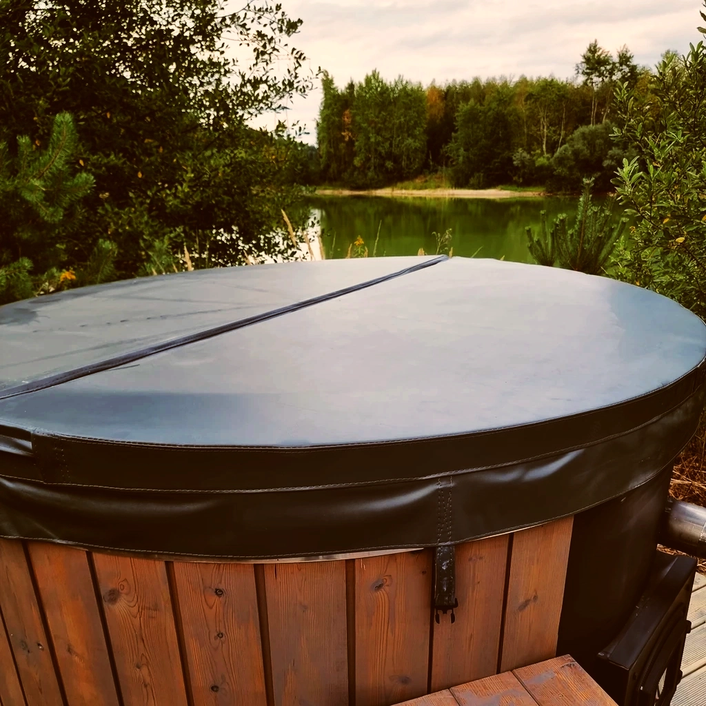 UV-resistant thermal cover made of yacht leather for a garden hot tub