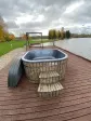 Wooden garden hot tub with hydromassage, Russian banya, wood-burning jacuzzi